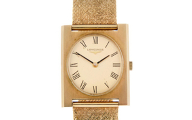 LONGINES - a gentleman's 9ct yellow gold bracelet watch.