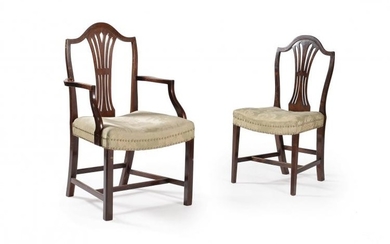 A set of twenty two mahogany dining chairs