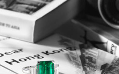 A Fine Emerald and Diamond Ring