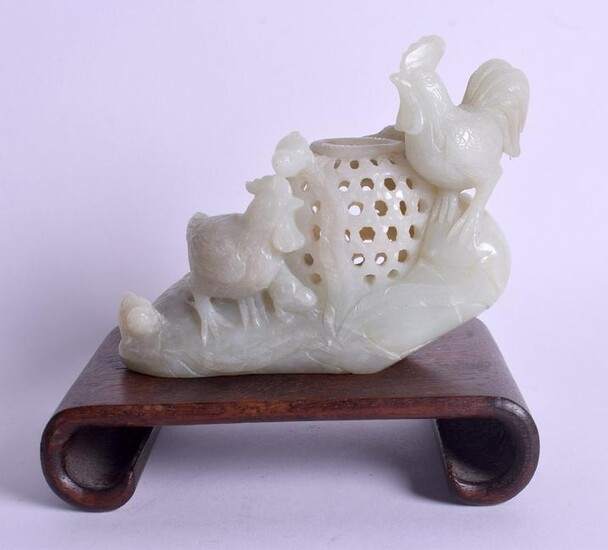 AN EARLY 20TH CENTURY CHINESE CARVED GREEN JADE CENSER
