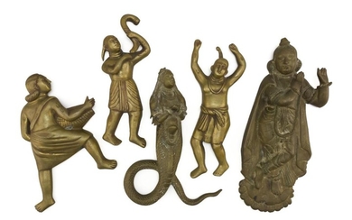 FIVE INDIAN BRASS FIGURAL PLAQUES A man with a basket, height 8.5", a mermaid, height 11", a man with a trumpet, height 10.25", a ma...
