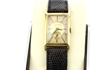 A 14ct yellow gold Eterna wristwatch (no. 3039037) on a black leather strap.
