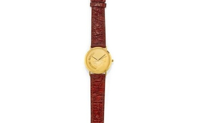 A 18k yellow gold man's wristwatch