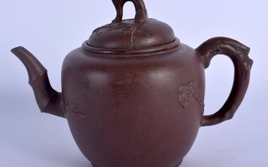 A 19TH CENTURY CHINESE YIXING POTTERY TEAPOT AND COVER