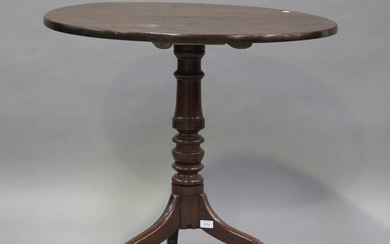 A 19th century mahogany tip-top wine table, raised on a turned column and tripod legs, height 77cm