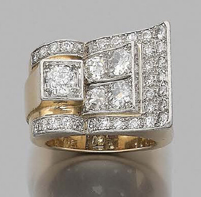 A 750 thousandths yellow gold ring decorated with...