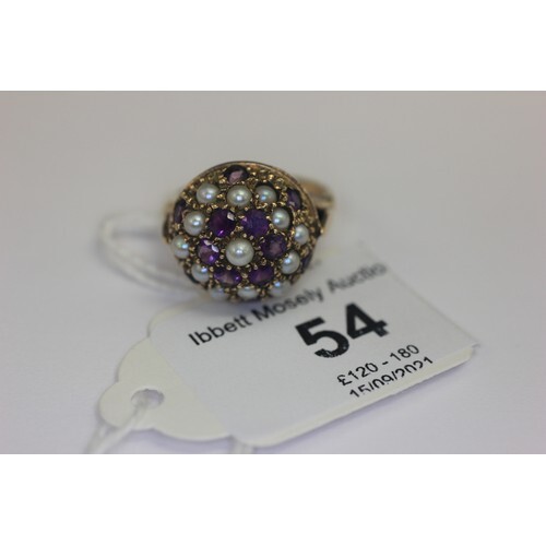A 9ct gold amethyst and seed pearl cluster dress ring.