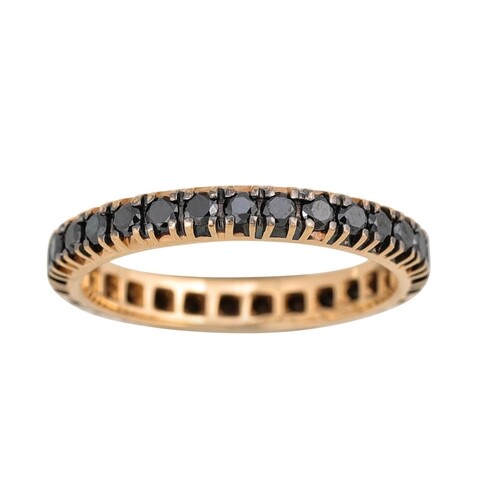 A BLACK DIAMOND ETERNITY RING, the circular stones mounted i...