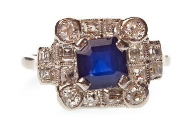 A BLUE GEM AND DIAMOND RING