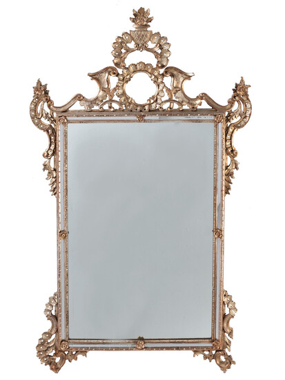 A Baroque Style Giltwood Mirror