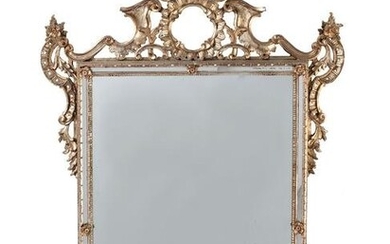 A Baroque Style Giltwood Mirror