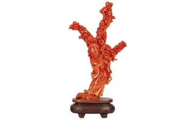 A CHINESE CORAL 'MAGU' CARVING.