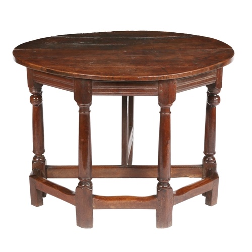 A Charles II oak credence type-table, with single rear drop-...