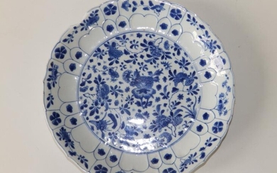 A Chinese Kangxi blue & white porcelain dish, having...