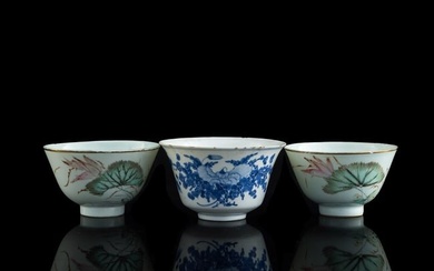 A Chinese blue and white and two famille rose cups, late 19th century
