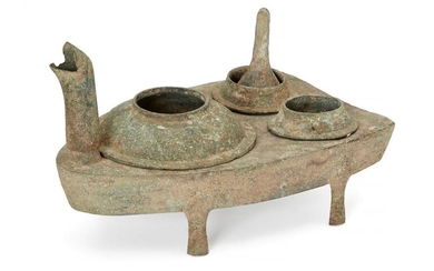 A Chinese bronze zoomorphic stove, Han dynasty, modelled as a...