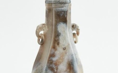 A Chinese chicken bone jade lidded vessel