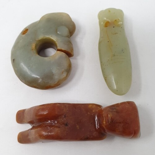 A Chinese jade netsuke, and two other Chinese carvings (3)