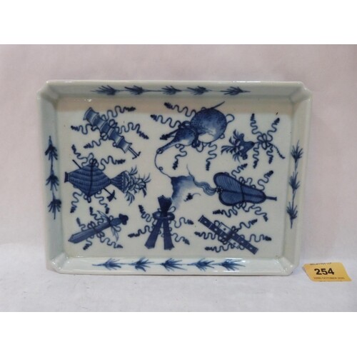 A Chinese rectilinear blue and white decorated dish. 9¼' wid...