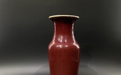 A Chinese sang deboeuf “oxblood” glaze vase.