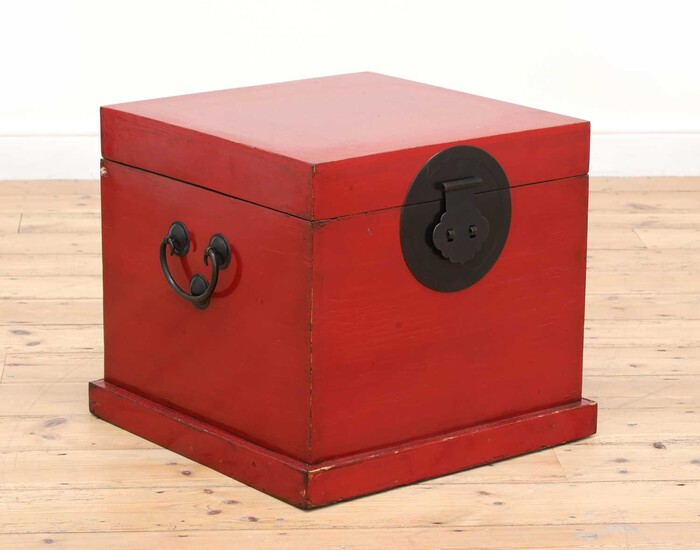 A Chinese-style red-lacquered box or occasional table