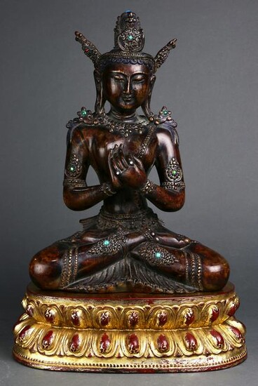 A Chinese wood sculpture of Bodhisattva