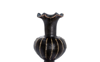 A Cizhou black-glazed ribbed floriform lobed vase, Song dynasty 宋 磁州窰黑釉堆線紋百合口瓶