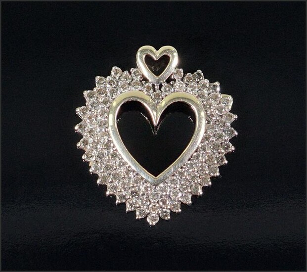 A Diamond Heart Pendant.