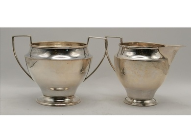 A George VI silver cream jug and twin-handled sugar bowl by ...