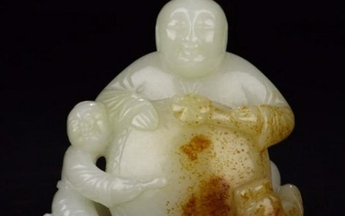 A HETIAN JADE KID PLAYING DRUM CARVED ORNAMENT