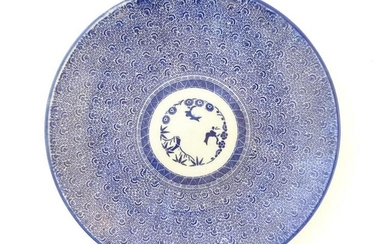 A Japanese blue and white sometsuke charger decorated