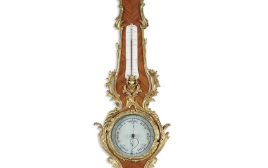 A Louis XV ormolu-mounted kingwood barometer Lange de Bourbon...