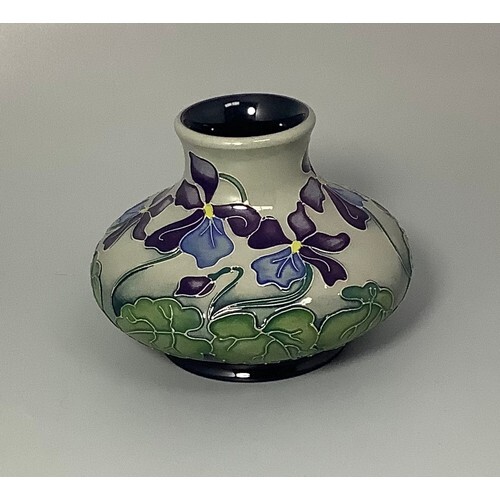 A Moorcroft pottery vase of compressed globular form and dec...