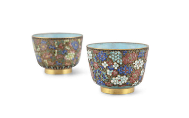 A NEAR PAIR OF CHAMPLEVE ENAMEL CUPS Possibly...