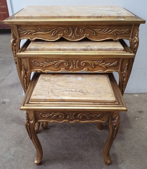 A NEST OF THREE FRENCH STYLE GILT PAINTED MARBLE TOP TABLES