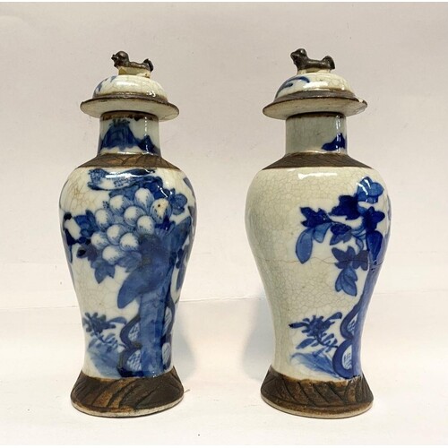 A PAIR OF EARLY 20TH CENTURY BLUE & WHITE CRACKLE WARE VASES...