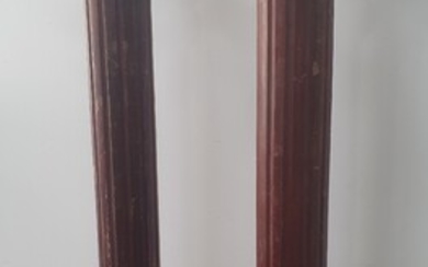 A PAIR OF LARGE FLUTED TIMBER COLUMNS