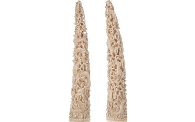 A PAIR OF SMALL CHINESE IVORY TUSK CARVINGS