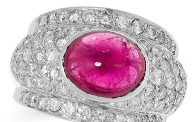 A PINK TOURMALINE AND DIAMOND RING set with an oval cut