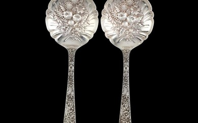 A Pair of S. Kirk & Son "Repousse" Sterling Silver Berry / Casserole Spoons