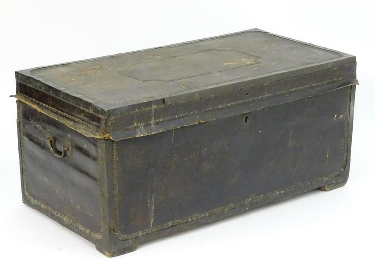 A Regency leather bound camphor wood trunk with brass