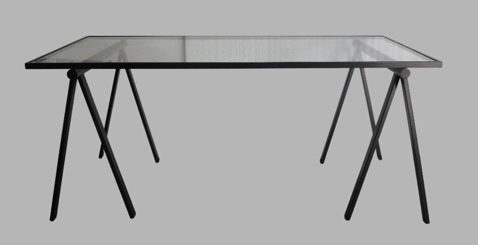 A Rodney Kinsman trestle table, black steel supports and glass top, 74cm high, 168cm wide, 76cm deep