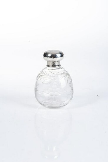 A SILVER TOPPED SCENT BOTTLE