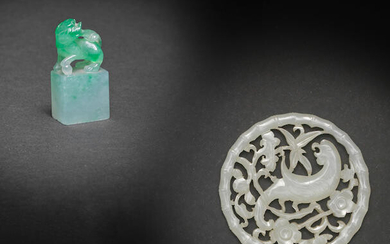 A SMALL JADEITE 'BUDDHIST LION' SEAL AND A WHITE JADE OPENWORK PENDANT