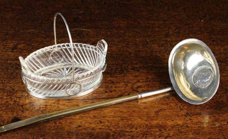 A Silver Toddy Ladle and a Silver Mounted Cut Crystal Bonbon Dish. The ladle with unmarked oval bowl
