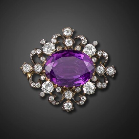 A Victorian amethyst and diamond-set brooch pendant, centred with an...