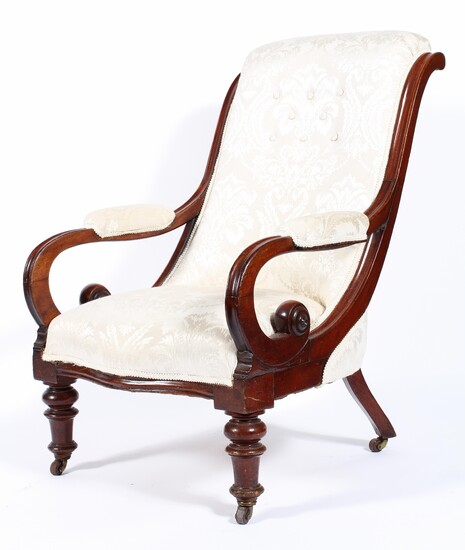 A Victorian mahogany framed library armchair