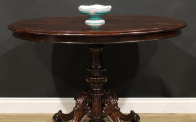 A Victorian rosewood centre table, oval top with moulded edg...