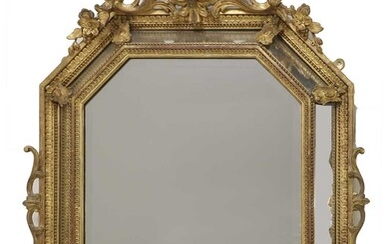 A carved giltwood framed lozenge-shaped wall mirror