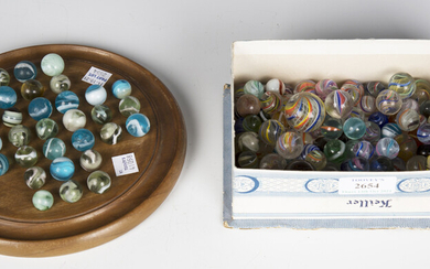 A collection of Victorian and later glass marbles, diameters ranging from 11mm to 30mm, together wit